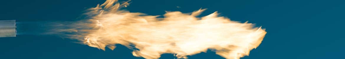 Darstellung einer Brennerflamme auf blauem Hintergrund