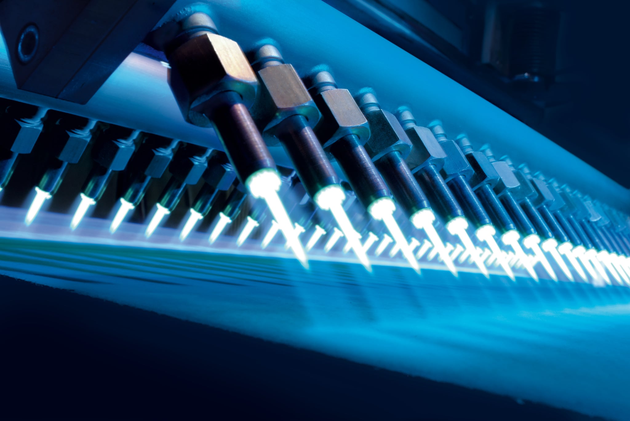 Multiple welding torches with blue flames for precision metal cutting using acetylene gas